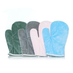 Four soft thermal anti-colic gloves in green, grey, pink, and blue, neatly arranged side by side.
