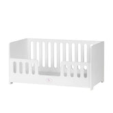 White wooden cradle with vertical slats, designed for ASI Dolls, featuring a soft padded mattress.