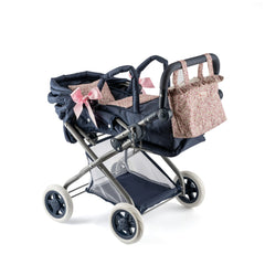 Dark stroller with floral accents and pink bows, designed for 36-46 cm dolls, featuring a matching diaper bag.