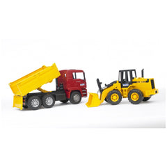 Red construction truck with tilted yellow bed and yellow articulated road loader on white background.