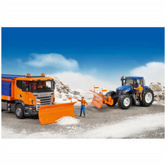 Orange toy truck and blue tractor with plow blades clearing imaginary snow, set against a bright sky.
