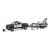 Bruder RAM 2500 police pickup with trailer and boat, featuring two figures in uniform, for kids aged 4 and up.