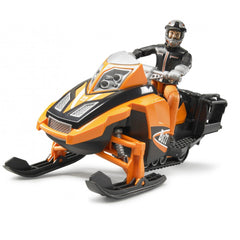 Orange and black snowmobile toy with driver figure in helmet and gear, featuring dual-axle suspension.