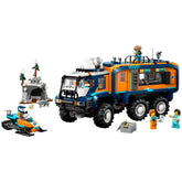 LEGO Arctic Explorer Science Lab Truck featuring vibrant orange and blue colors, with six wheels and intricate details. Accessories include a toy snowmobile, explorers, and a cave with wildlife. The truck has a rooftop observatory and a detailed lab inside.