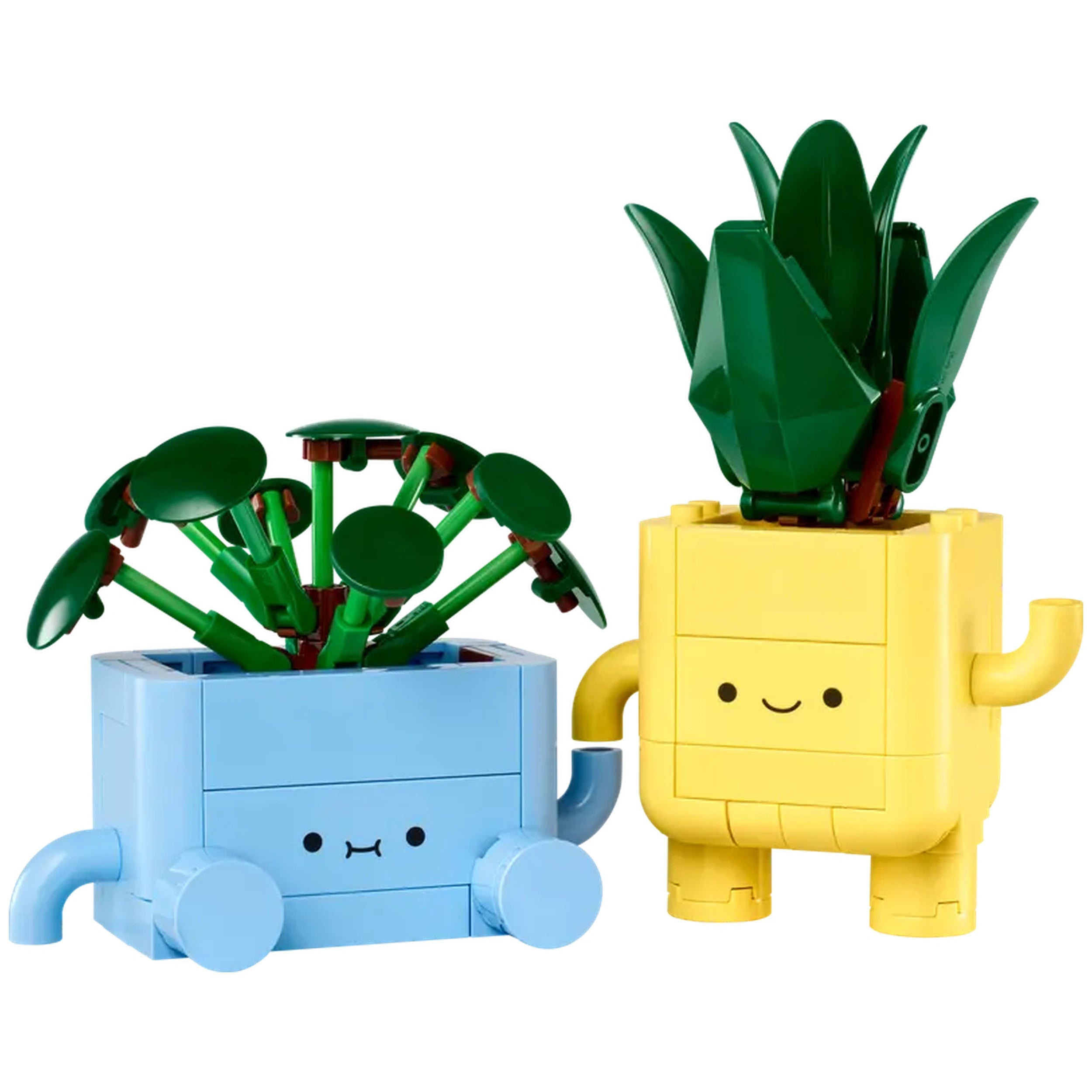 Two colorful LEGO plant toys: a blue pot with a smiling face holding green leaves and a yellow pot with a grinning face topped with a leafy crown, both exuding charm and playfulness.