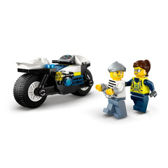 Two LEGO minifigures, a police officer and a crook in striped attire, stand next to a sleek police motorcycle. The motorcycle features wide tires and vibrant blue and white details. The police officer has a confident expression while apprehending the crook, who appears mischievous. Together, they depict an imaginative police chase scene.