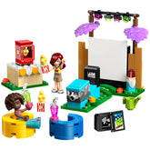 LEGO Friends Friendship Movie Night set featuring two minidolls, a popcorn stand, a mini projector, and colorful seating.