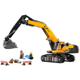 LEGO City Yellow Construction Excavator set featuring a detailed digger, two barriers, and three minifigures engaging in role play.