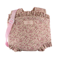 Floral baby carrier with pink ruffled edges and strap, designed for dolls 30-46 cm from the ASI Dolls Martina Collection.
