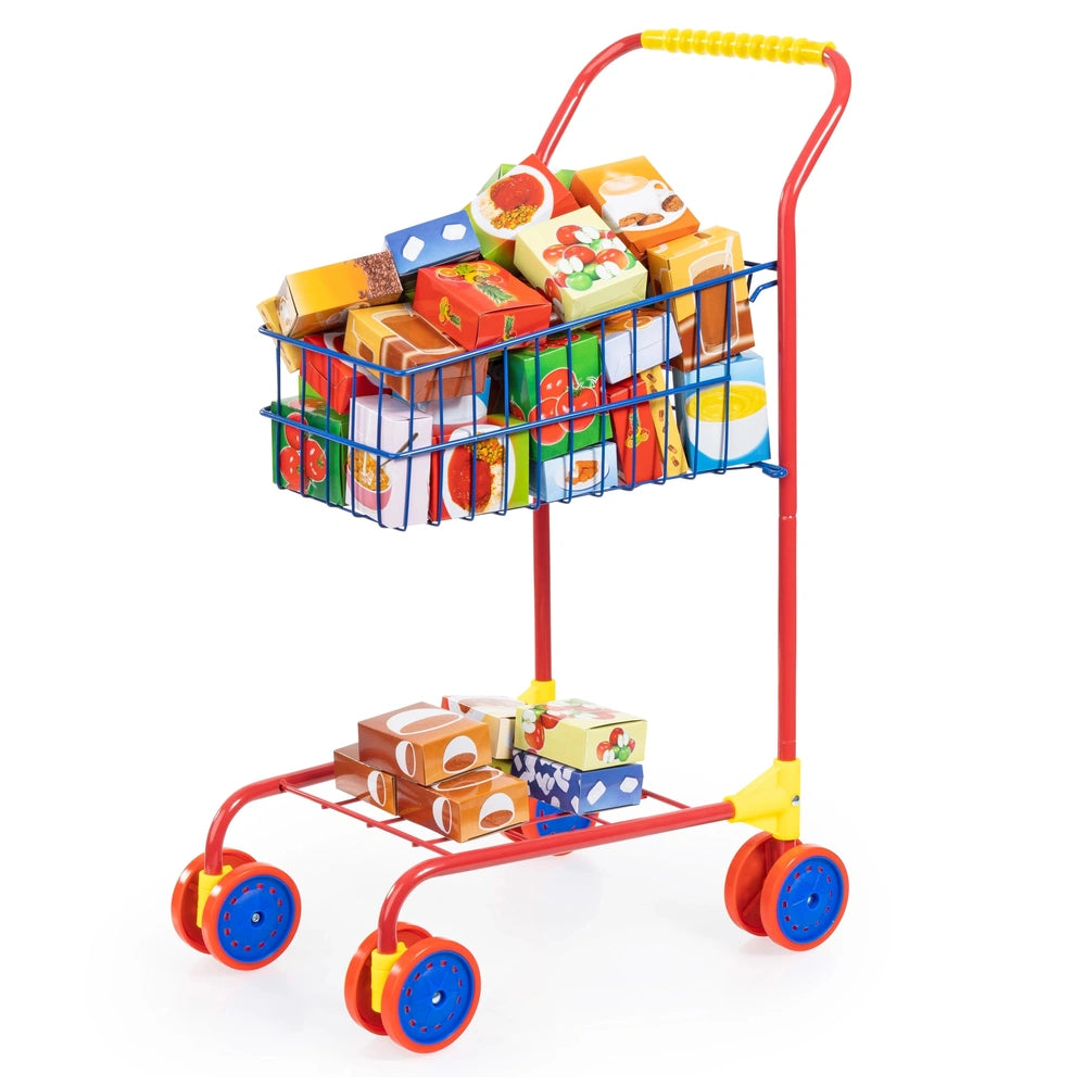 BAYER DESIGN shopping cart in red plastic with blue wheels, holding colorful food packages and featuring a yellow handle.