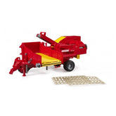 Red Bruder Grimme SE75-30 Potato Digger toy with yellow conveyor belts and imitation potatoes displayed on the side.