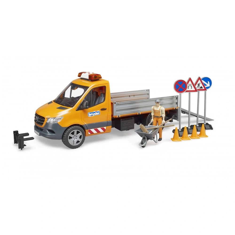 Orange and black Mercedes-Benz Sprinter toy with accessories, including traffic signs, pylons, wheelbarrow, and a road worker figure.