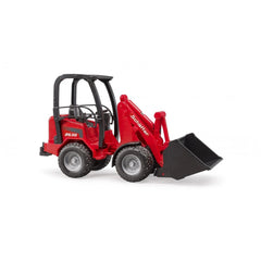 Red Bruder Schaffer Compact Loader 2630 toy with functioning bucket and steering, side view on a white background.
