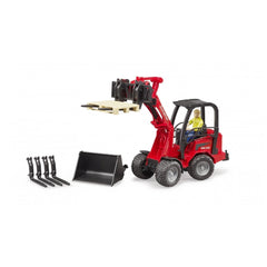 Red Bruder Schäffer Compact Loader 2630 with figure, lifting a pallet. Includes additional bucket and forks for versatility.