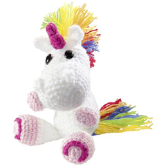 Folia Mini Crochet Kit features a white unicorn plush toy with a colorful tail, pink hooves, and black eyes.