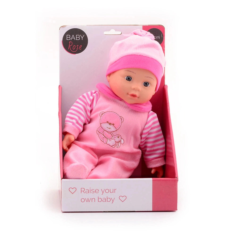 Baby Rose Doll in pink outfit and hat, displayed in clear plastic window of pink cardboard packaging with "Raise your own bab