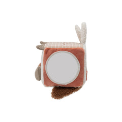 Jollein Activity Cube features soft orange and white fabric with a white circular top and a brown fuzzy bottom surface.