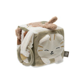Jollein Activity Cube features a light beige plush design with a smiling face, black eyes, brown nose, and a zipper.
