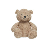 Jollein teddy bear in light brown plush with fuzzy texture, featuring round head, ears, eyes, nose, and limbs.