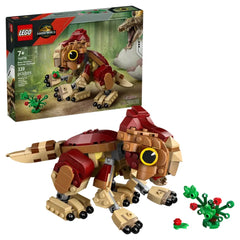 LEGO Baby Dinosaur Dolores Aquilops set, featuring a brick-built dinosaur in red and brown, with movable limbs, alongside a colorful plant.