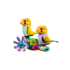 Two colorful LEGO® birds with yellow heads and movable petals, surrounded by vibrant blocks and a flower, showcasing creativity and nature.