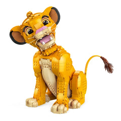 LEGO® Disney Young Simba figure, smiling with large expressive eyes, crafted in bright yellow and sandy beige tones, showcasing movable head and tail, perfect for display.