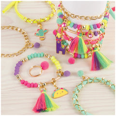 MAKE IT REAL Neo-Brite Chains and Charms featuring gold-tone chains, colorful beads, and felt balls in vibrant hues.