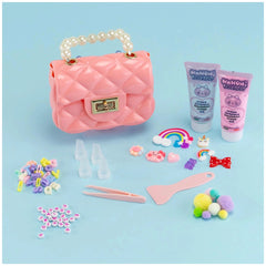Momomi Decoden Kawaii Artist Creamy Bag made of textured fabric, featuring metallic zipper and multiple clasps.