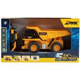 Mondo Motors RC MX Dumper in yellow and black, displayed in yellow cardboard packaging with black text.