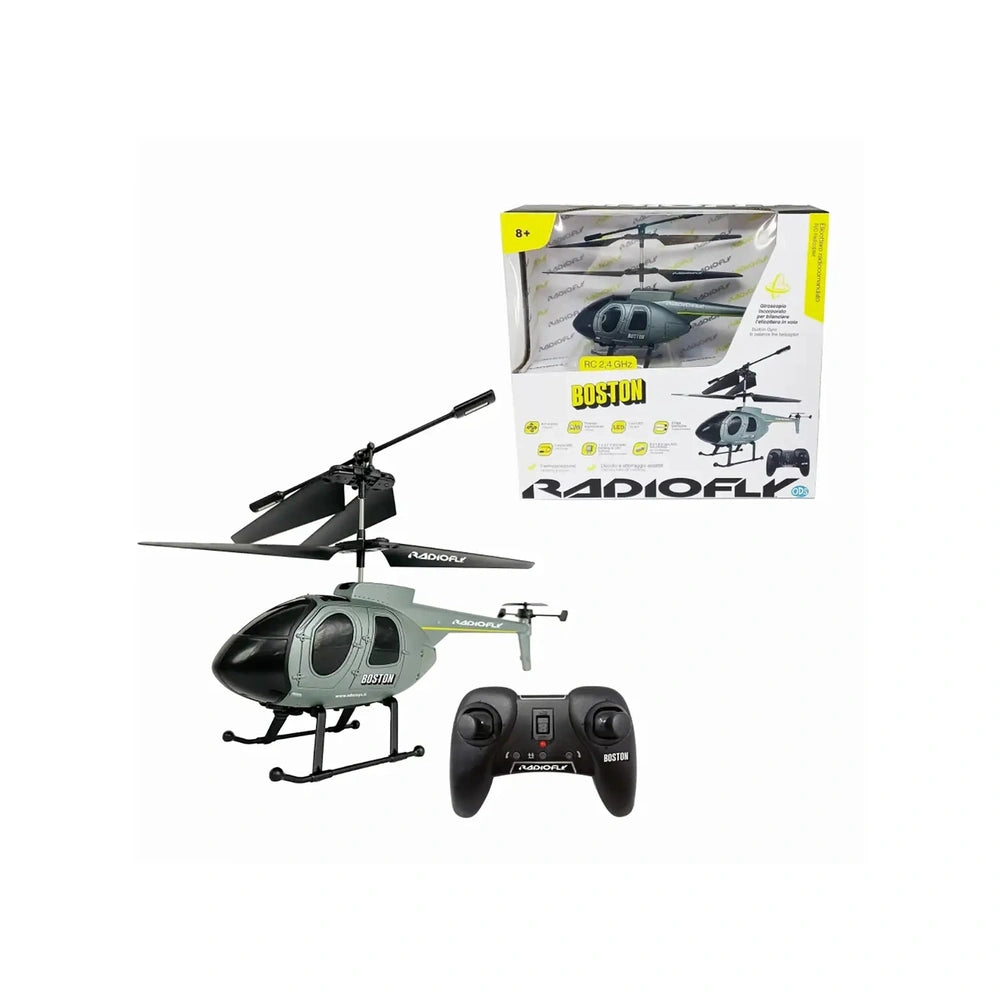 Black and gray ODS Radiofly RC Helicopter Boston with remote control, featuring glossy cardboard packaging and age rating 8+.