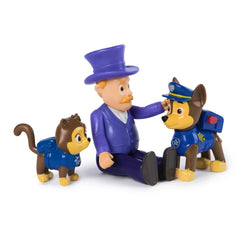 Paw Patrol Action Pups set features a purple humanoid figure with a top hat and two blue-uniformed dog figures, one with a ba