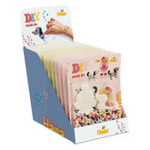 Pet Hama Iron-on Bead Set in retail packaging featuring pink, yellow, and blue colors, with crafting instructions and assorte