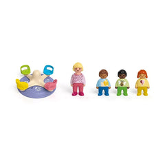 Playmobil Junior Number Merry-Go-Round toy features colorful plastic dolls in yellow, pink, green, and more on a purple surfa