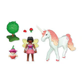 Playmobil Magic Unicorns toy playset features glossy unicorn and fairy figures alongside a matte tree and colorful mushrooms.