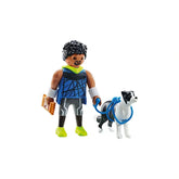 Playmobil MY LIFE Jogger toy set features a dark brown figure in a blue outfit with a black and white patterned dog and blue