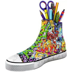 High-top sneaker features a vibrant, abstract design with bright colors including yellow, pink, blue, and green.
