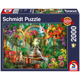 Schmidt Spiele puzzle box featuring a colorful whimsical garden scene with a cat, bird, and fountain, showcasing vibrant deta