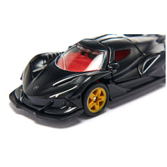 Black toy car with a glossy finish, red interior, and yellow wheels, displayed on a white surface.