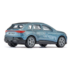 Audi Q4 e-tron model car in glossy blue with silver wheels, red details, and visible windows against a white background.
