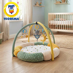Teorema GoGO Soft Play Gym features a plush play mat with a monkey toy in a cozy child's bedroom setting.