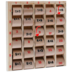 Teorema educational toy features a wooden structure with labeled compartments containing cylindrical objects for learning mul