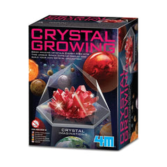 4M Crystal Growing Red Edition toy playset in glossy cardboard packaging with colorful shiny crystals displayed through a pla