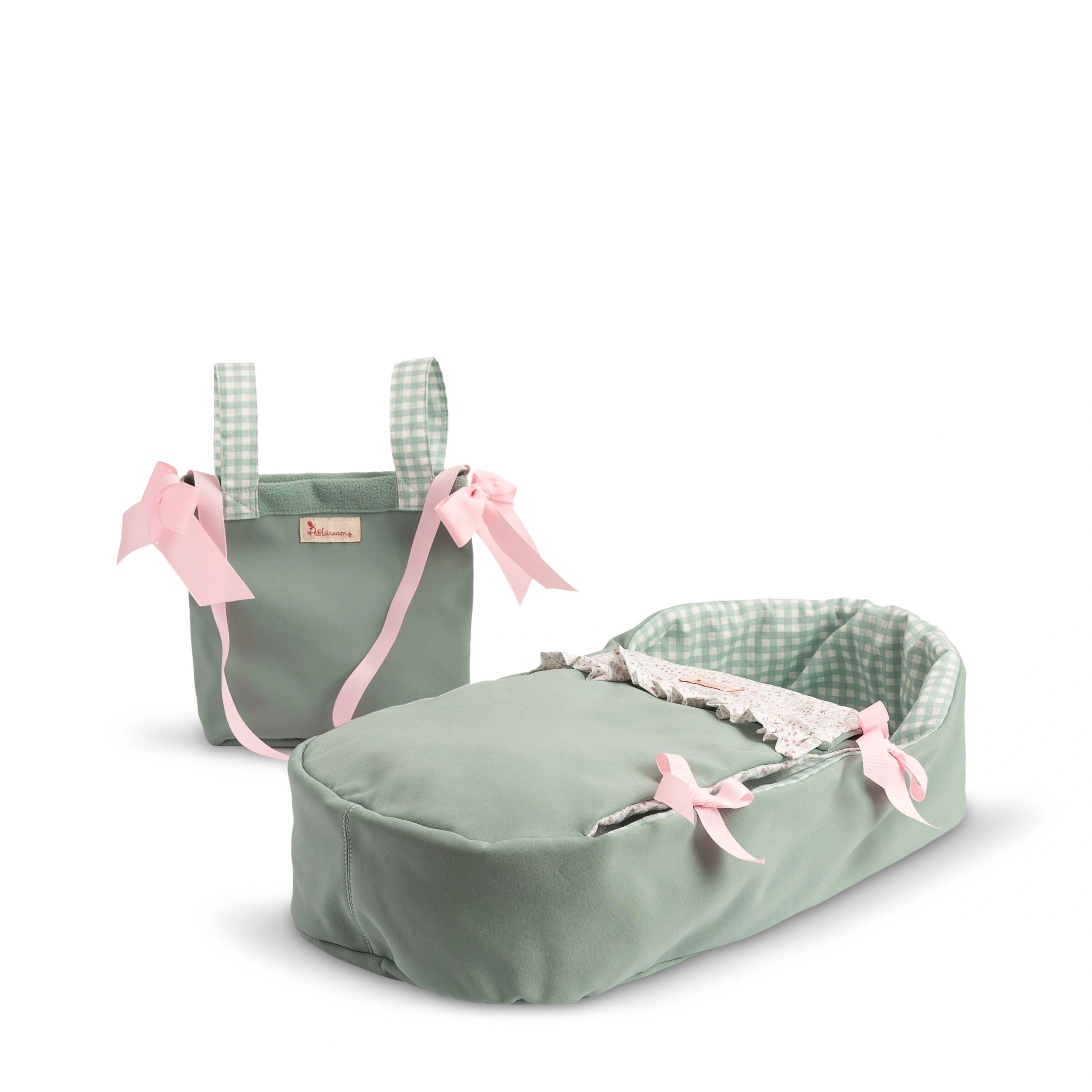 Mint green doll carrycot and bag set with pink bows and gingham interior.