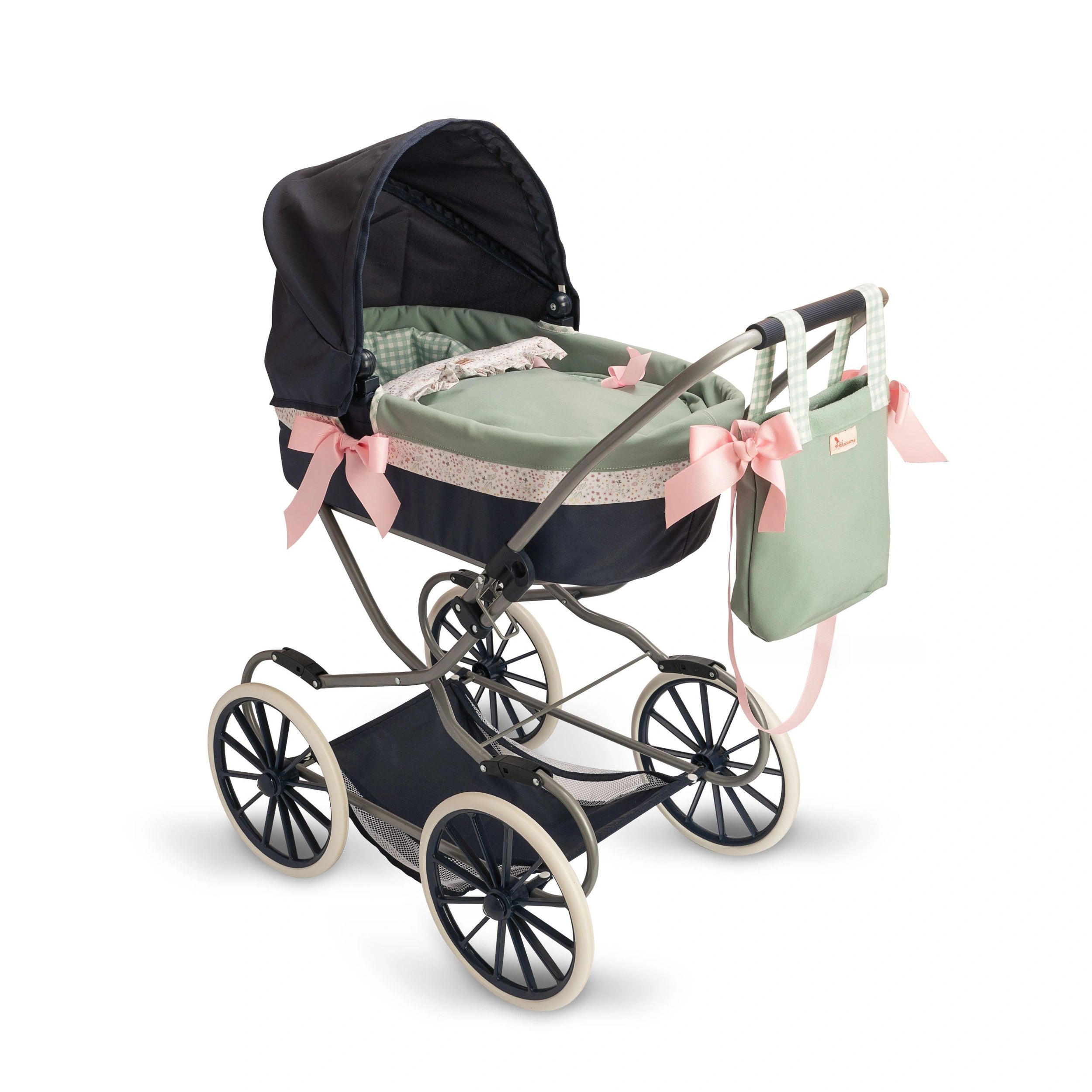 Elegant doll stroller with green carrycot, pink bows, and removable hood on black and white wheels. Includes matching bag.