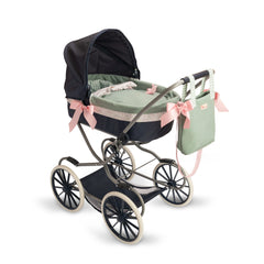 Elegant doll stroller with green carrycot, pink bows, and removable hood on black and white wheels. Includes matching bag.