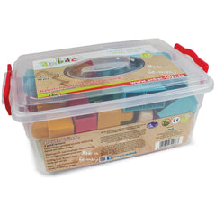 Clear plastic box with multicolored Anbac sanitizing bricks, labeled 'Made in Germany', and red handles.