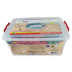 Clear plastic box with colorful bricks inside, labeled "Anbac toys" and "Made in Germany," featuring red handles.