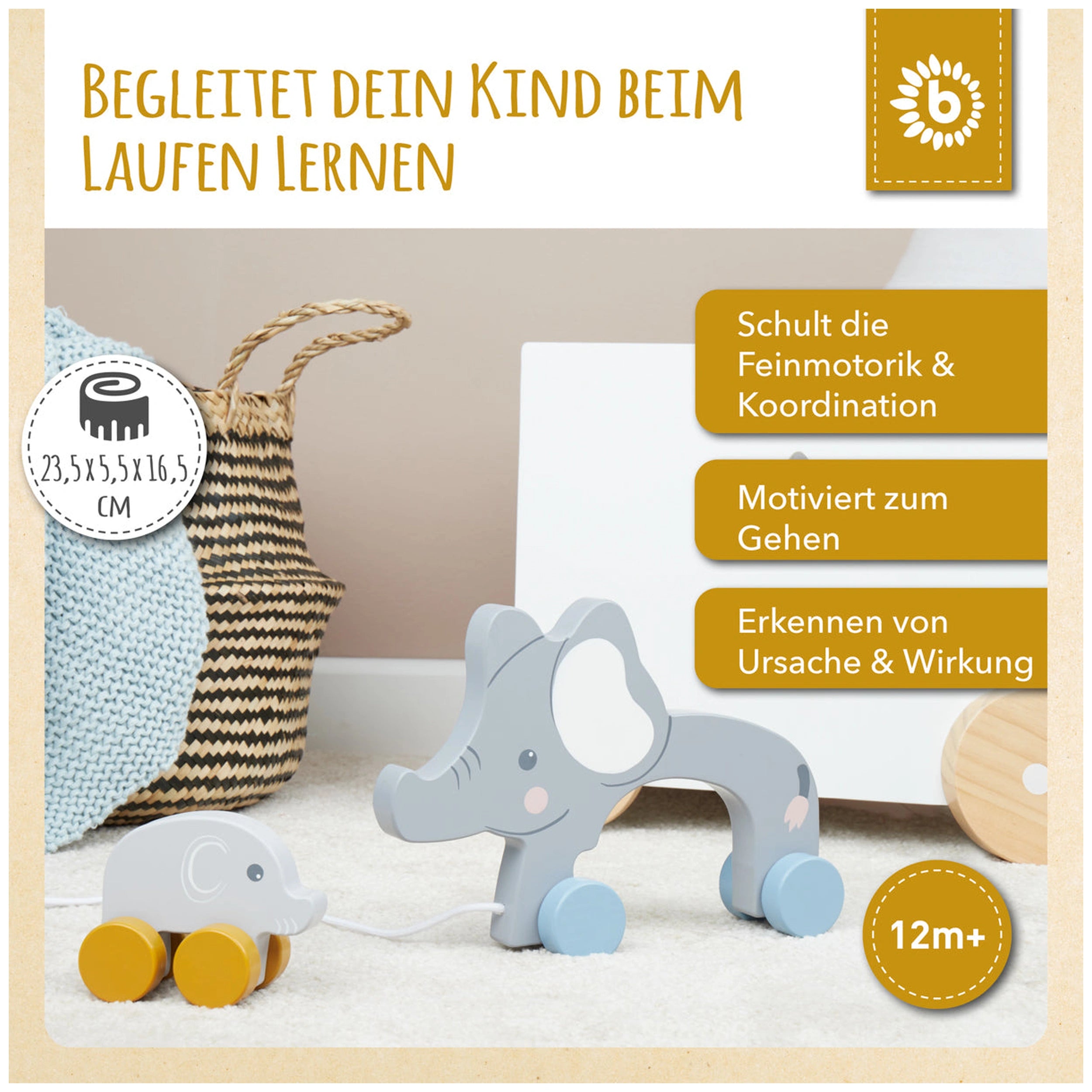BIECO Pull-Along Elephants, featuring a larger elephant with a baby, both painted in soft gray hues, alongside a decorative woven basket in a cozy room.