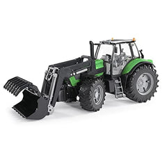 Green and black toy tractor with front loader, detailed cabin, and large off-road tires.