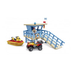 Lifeguard tower set with red quad bike, yellow watercraft, and lifeguard figure in uniform on a blue platform.
